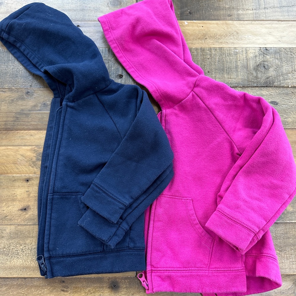 Pair of Pink and Navy Hooded Sweatshirts